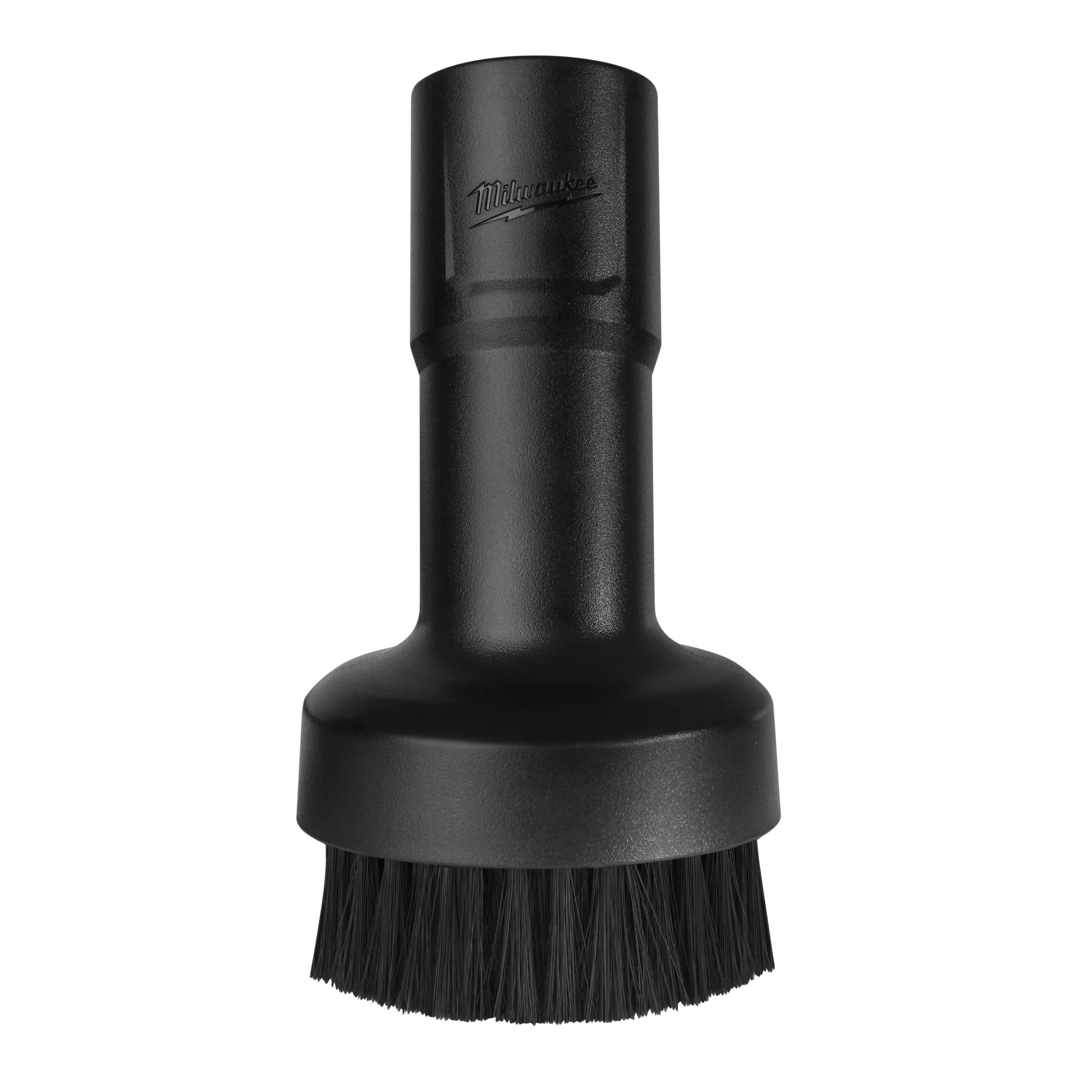 Black brush nozzle attachment for the M18 FUEL™ Compact Vacuum. The nozzle has bristles at the bottom and a cylindrical connection at the top. The manufacturer's logo is embedded near the top of the nozzle. The tool is designed for effective cleaning in tight spaces.