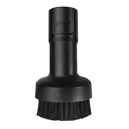 Black brush nozzle attachment for the M18 FUEL™ Compact Vacuum. The nozzle has bristles at the bottom and a cylindrical connection at the top. The manufacturer's logo is embedded near the top of the nozzle. The tool is designed for effective cleaning in tight spaces.