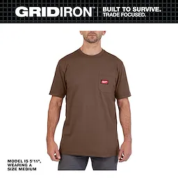Model wearing the GRIDIRON Pocket T-Shirt - Short Sleeve in brown, featuring a front chest pocket. The model is 5'11", wearing a size medium.
