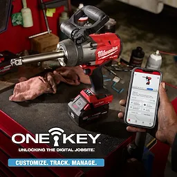 M18 FUEL 3/4" Extended Anvil High Torque Impact Wrench w/ ONE-KEY Kit beside phone showing M18 FUEL 3/4" Extended Anvil High Torque Impact Wrench w/ ONE-KEY.