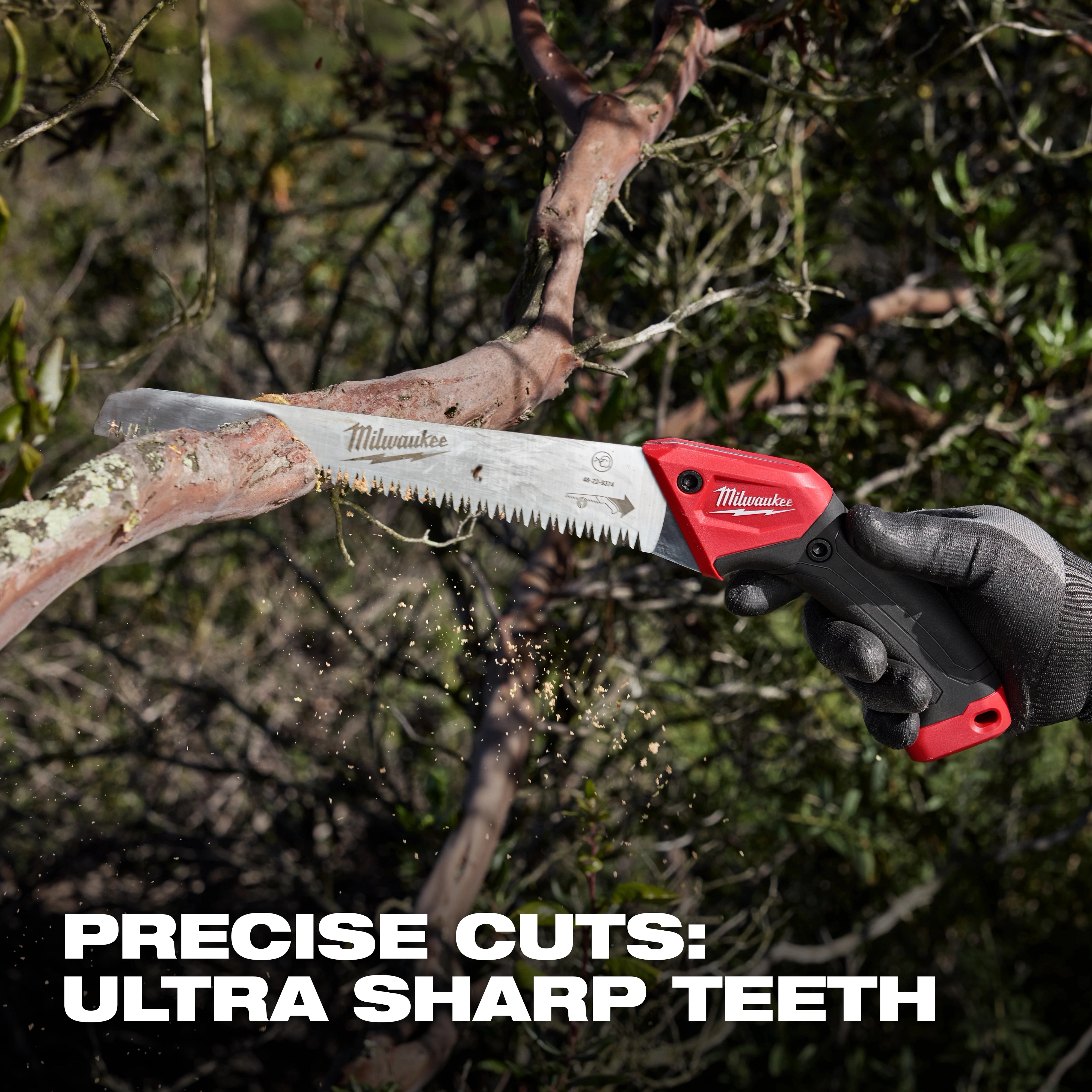 10” Fixed Pruning Saw – Straight Blade cutting through a tree branch outdoors.