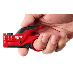 Hand holding a red Milwaukee cable stripping tool with black grip and measurement markings.
