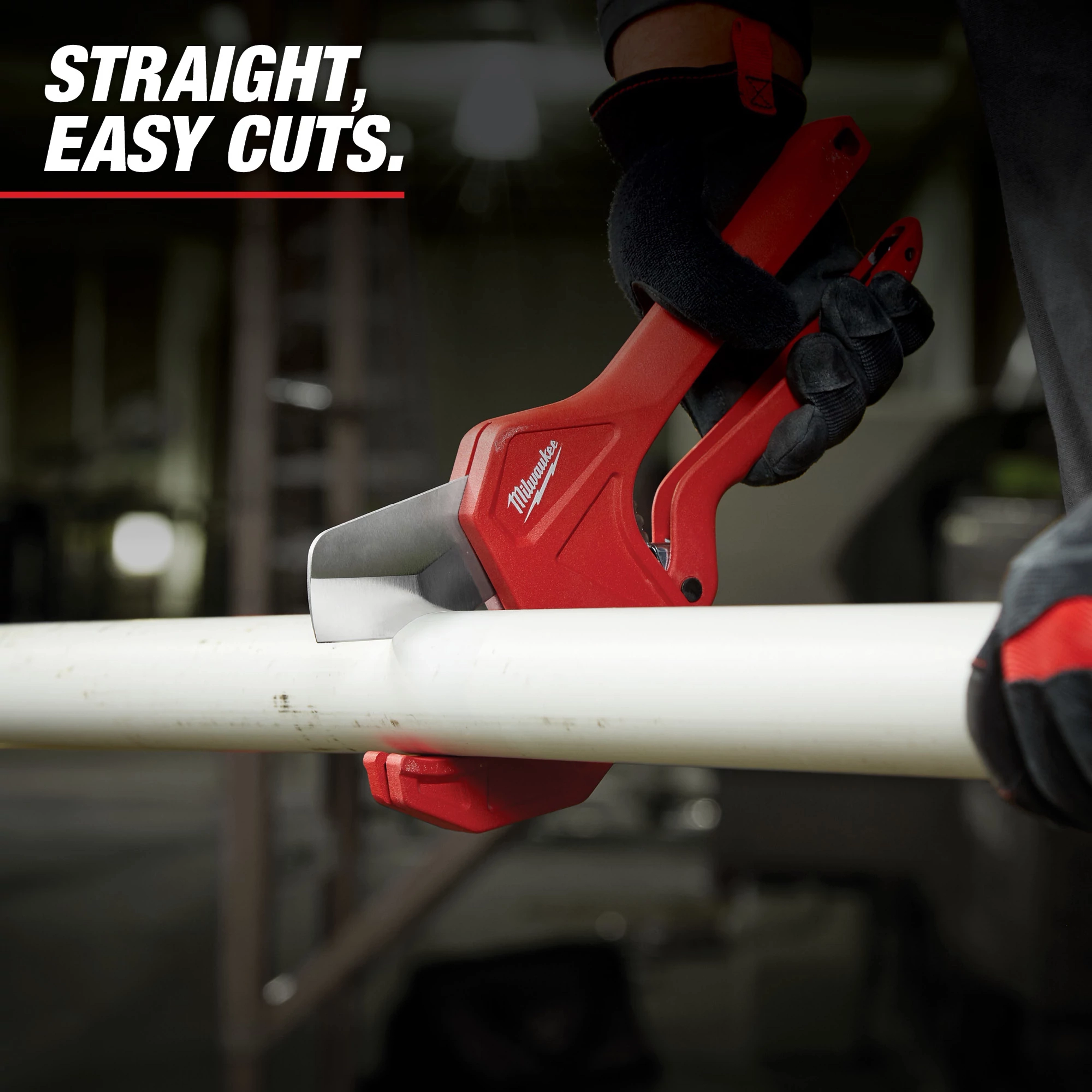Person cuts a white PVC pipe using Milwaukee Pipe Cutters. The tool has a red handle and black grip, ensuring precise and easy cuts. The background features a workshop setting and the text "STRAIGHT, EASY CUTS" is displayed at the top left.