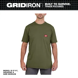 Model wearing a size medium GRIDIRON Pocket T-Shirt - Short Sleeve in olive green, featuring a small chest pocket with a red patch.