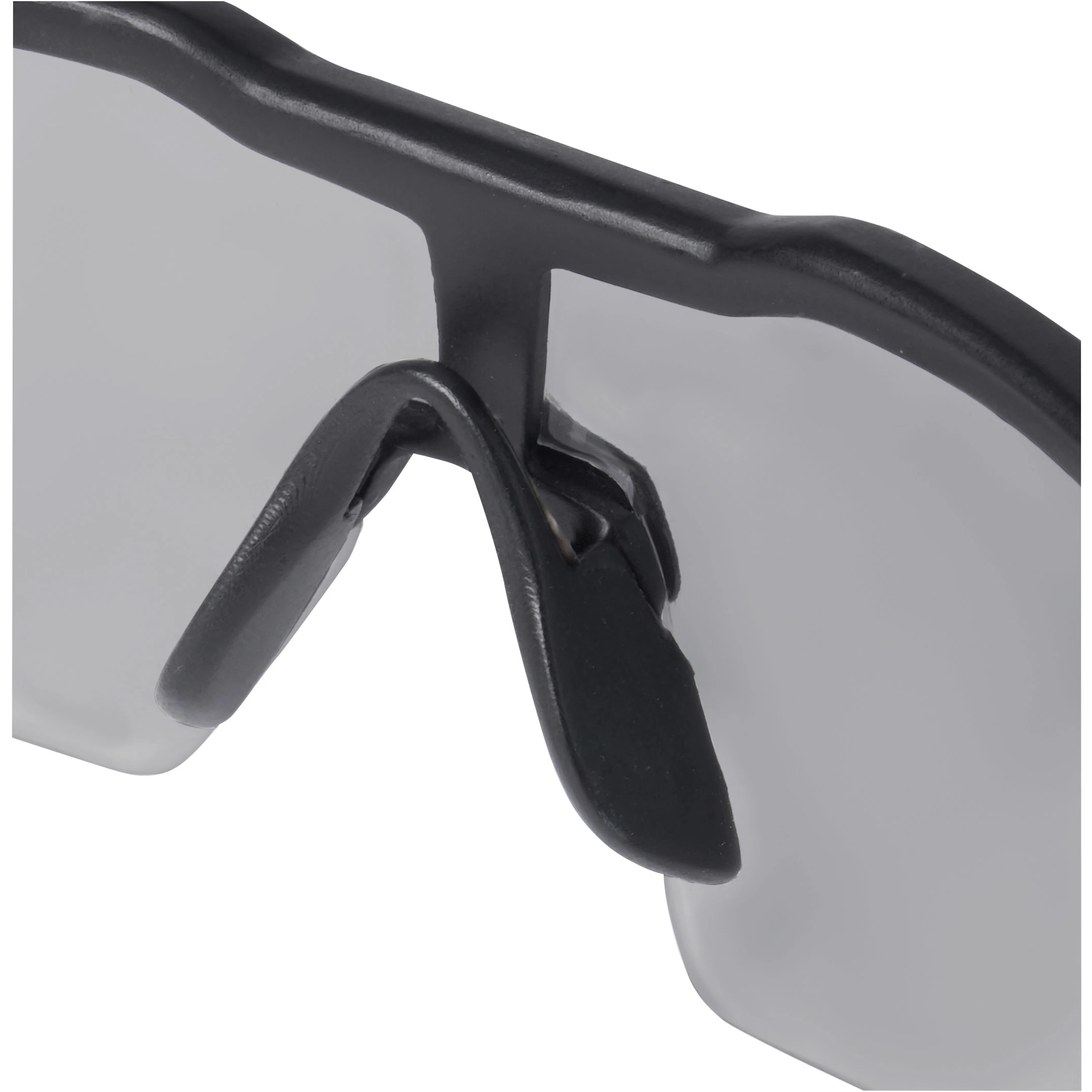 Safety Glasses with gray anti-scratch lenses feature a black frame and adjustable nose pads for comfort and secure fit.