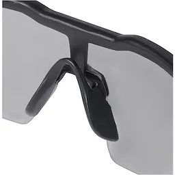 Safety Glasses with gray anti-scratch lenses feature a black frame and adjustable nose pads for comfort and secure fit.
