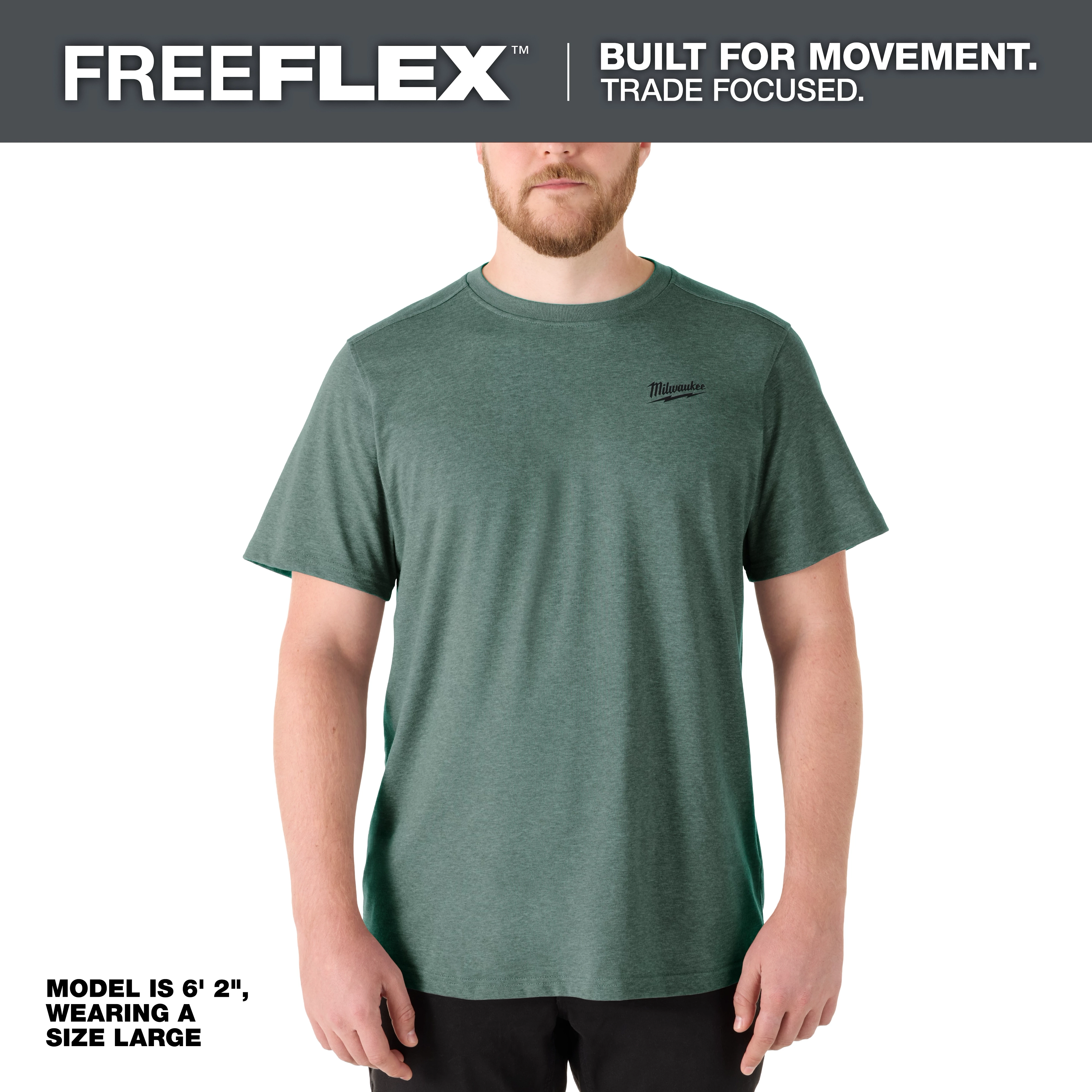 FREEFLEX Hybrid Work Tee - Short Sleeve in green worn by a 6'2" model in size large. The shirt is designed for movement.