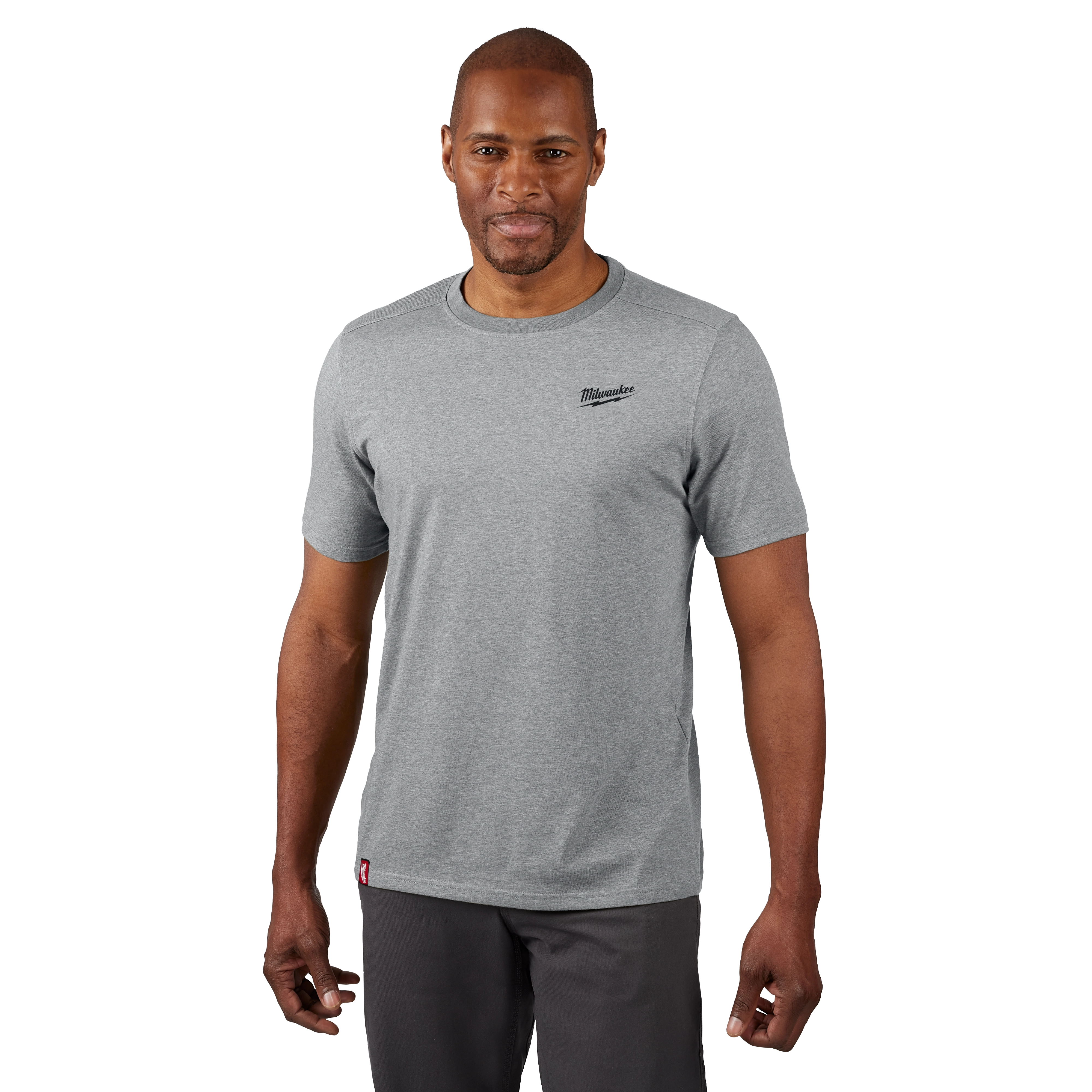 Grey FREEFLEX Hybrid Work Tee - Short Sleeve with crew neck and brand logo on the left chest, worn by a person with dark pants.