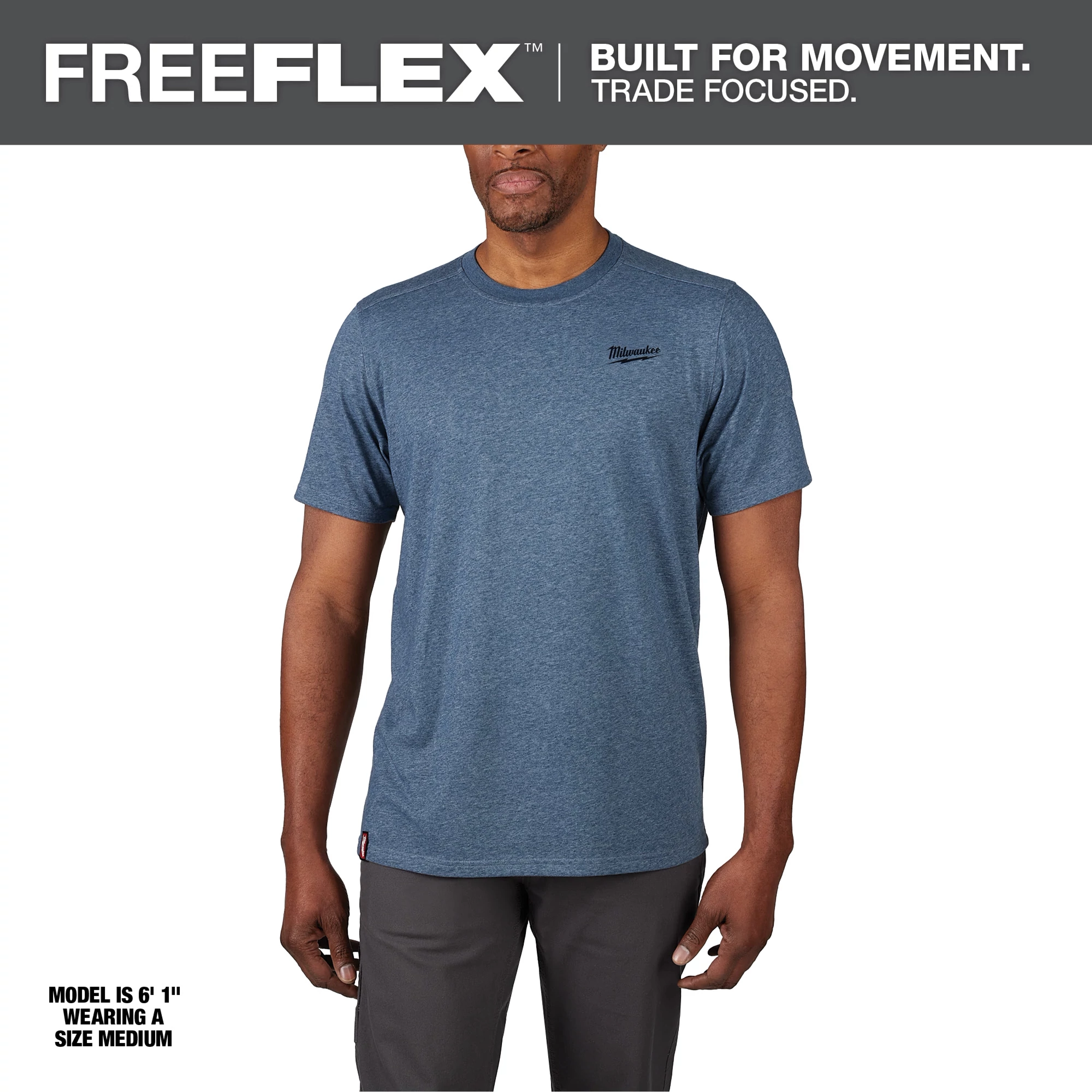 Hybrid Work Tee - Short Sleeve - Blue Primary Image features a model wearing a blue short sleeve T-shirt and gray pants.