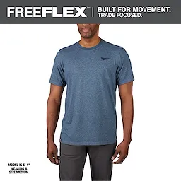 Hybrid Work Tee - Short Sleeve - Blue Primary Image features a model wearing a blue short sleeve T-shirt and gray pants.