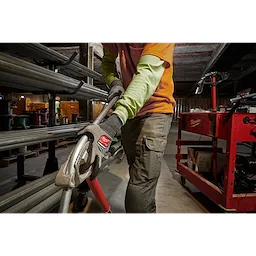 Worker wearing the Cut 2 High-Dexterity Gloves while using a power tool