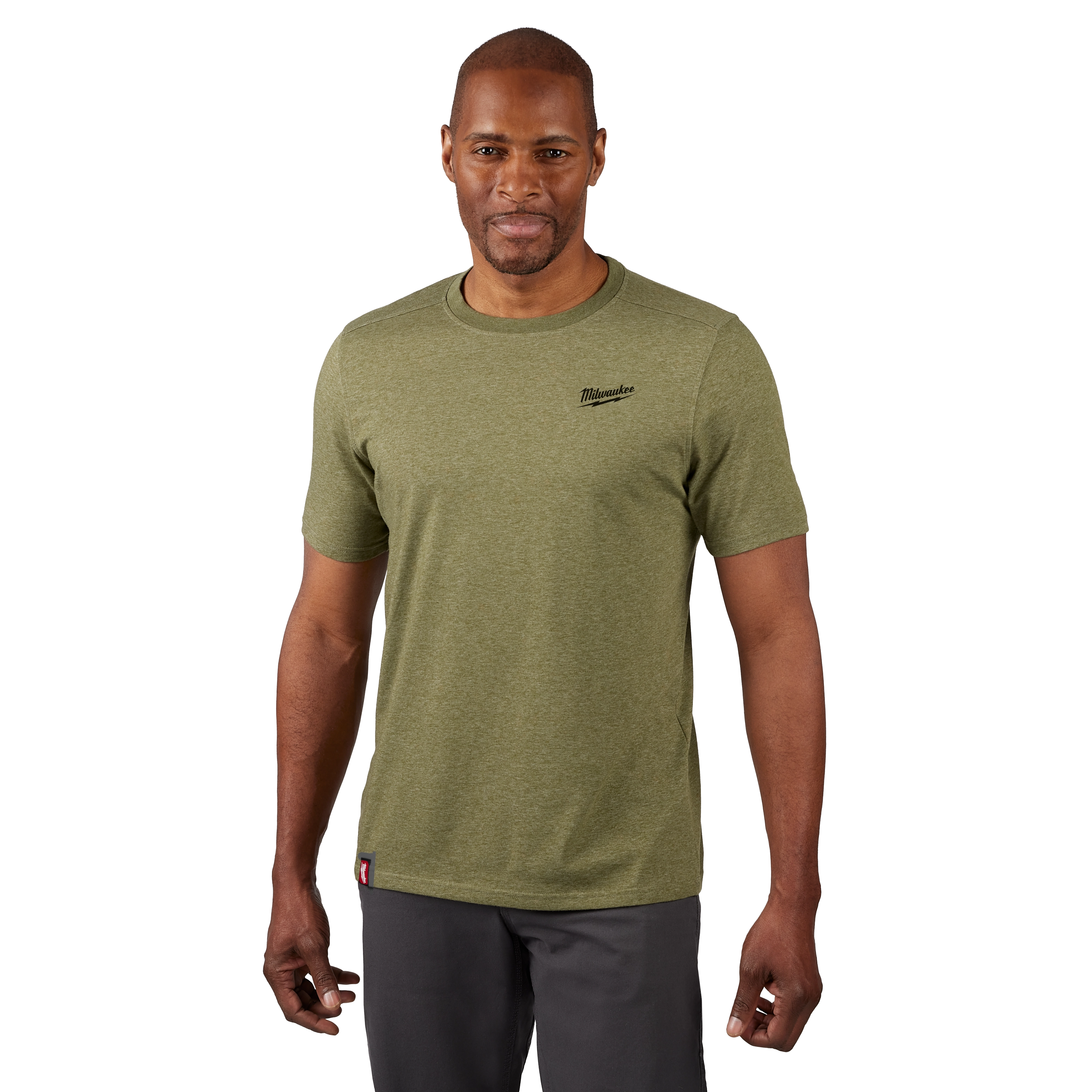 FREEFLEX Hybrid Work Tee - Short Sleeve in olive green, with a small logo on the left chest, worn by a person with grey pants.