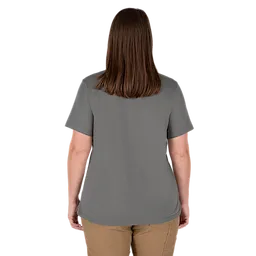 A woman with brown hair is shown from the back wearing a short-sleeve gray t-shirt and tan pants. The description of the t-shirt is Women%27s%20GRIDIRON%E2%84%A2Pocket%20T-Shirt%20-%20Short%20Sleeve%20Gray. The shirt has a plain design without visible logos or patterns.