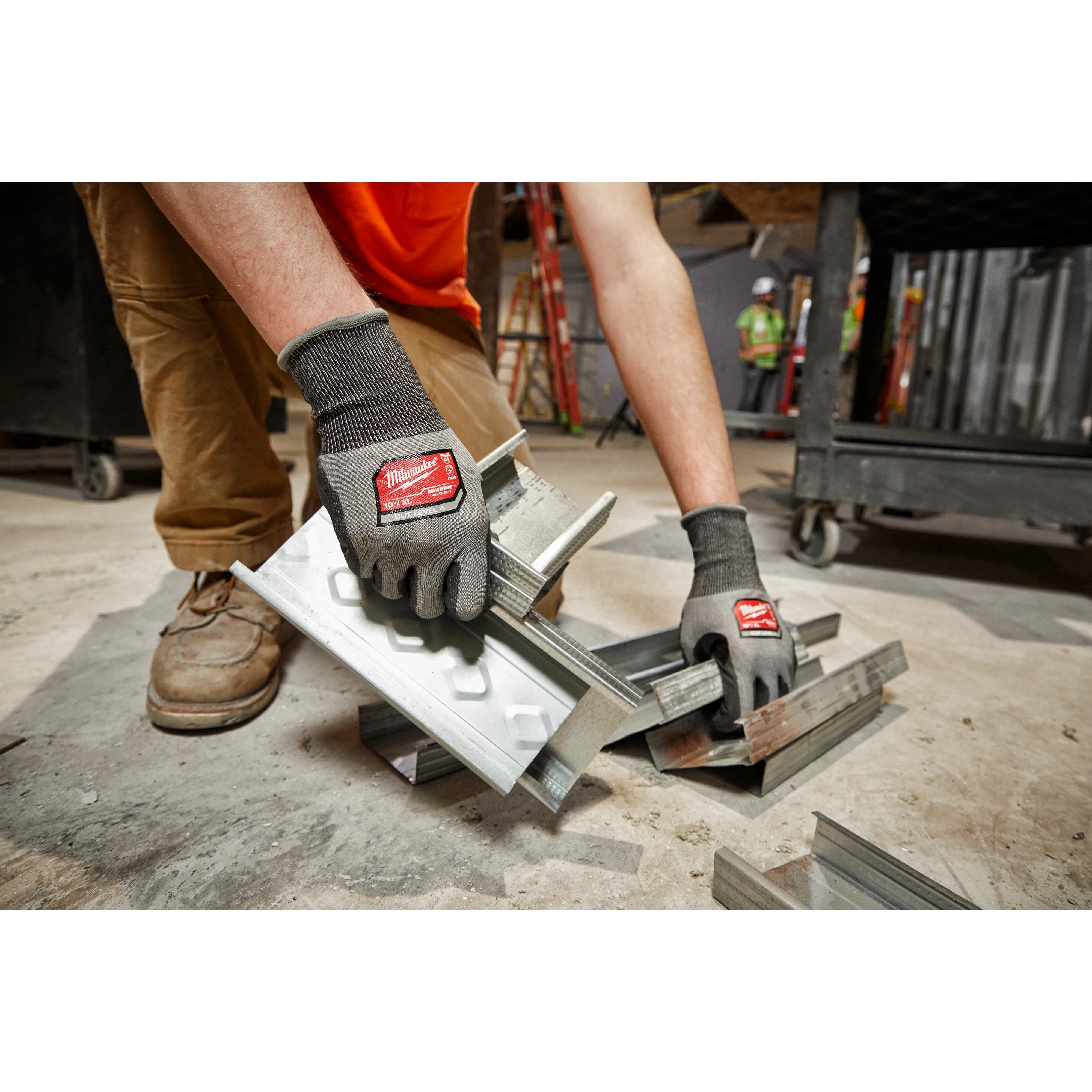 Worker wearing the Cut 4 High-Dexterity Gloves while on the jobsite