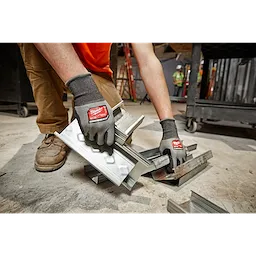 Worker wearing the Cut 4 High-Dexterity Gloves while on the jobsite