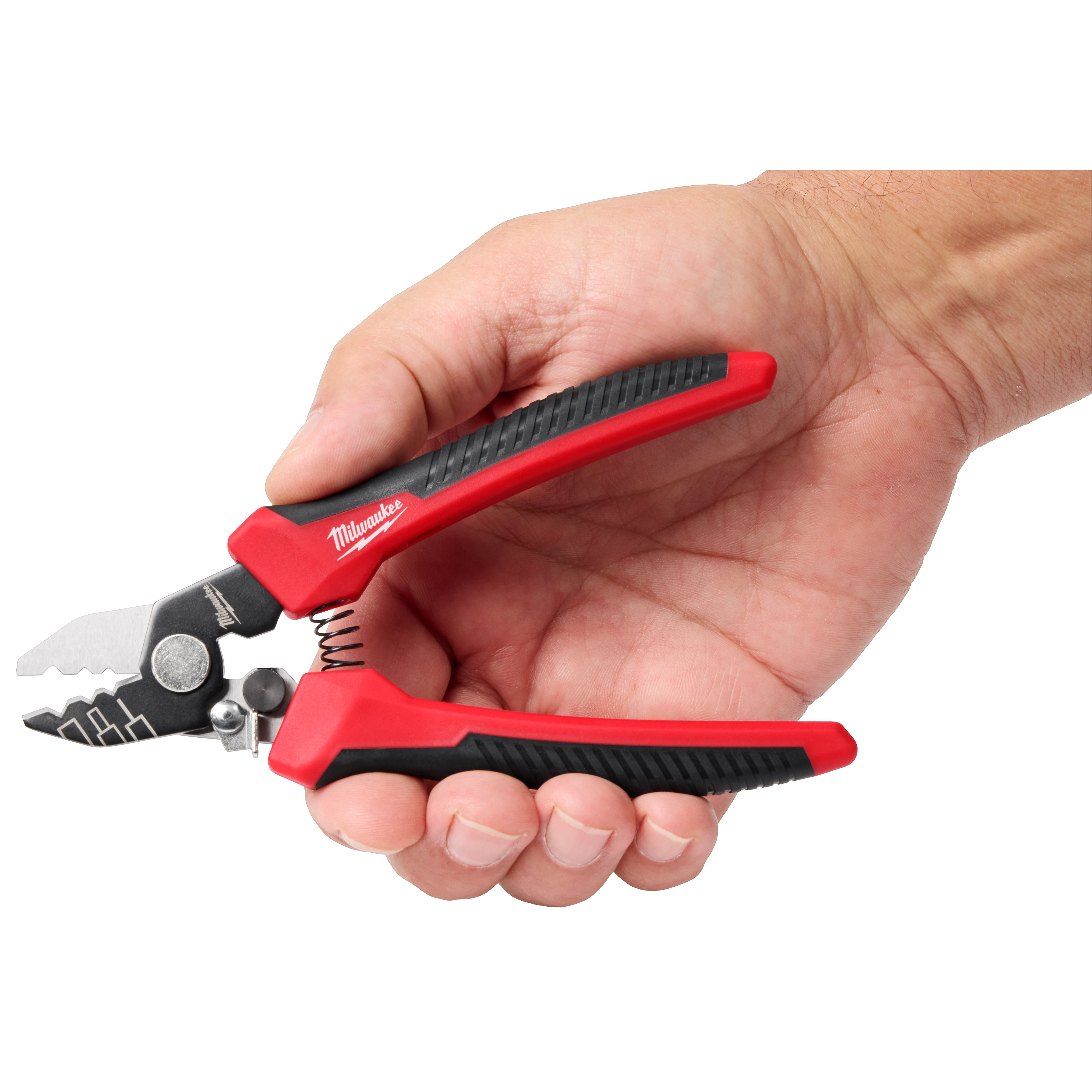 Hand holding red and black wire stripper with visible brand logo.