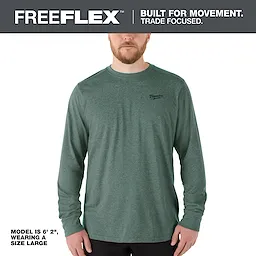 A model wearing a green FREEFLEX Hybrid Work Tee - Long Sleeve, standing against a white background, indicating size large.