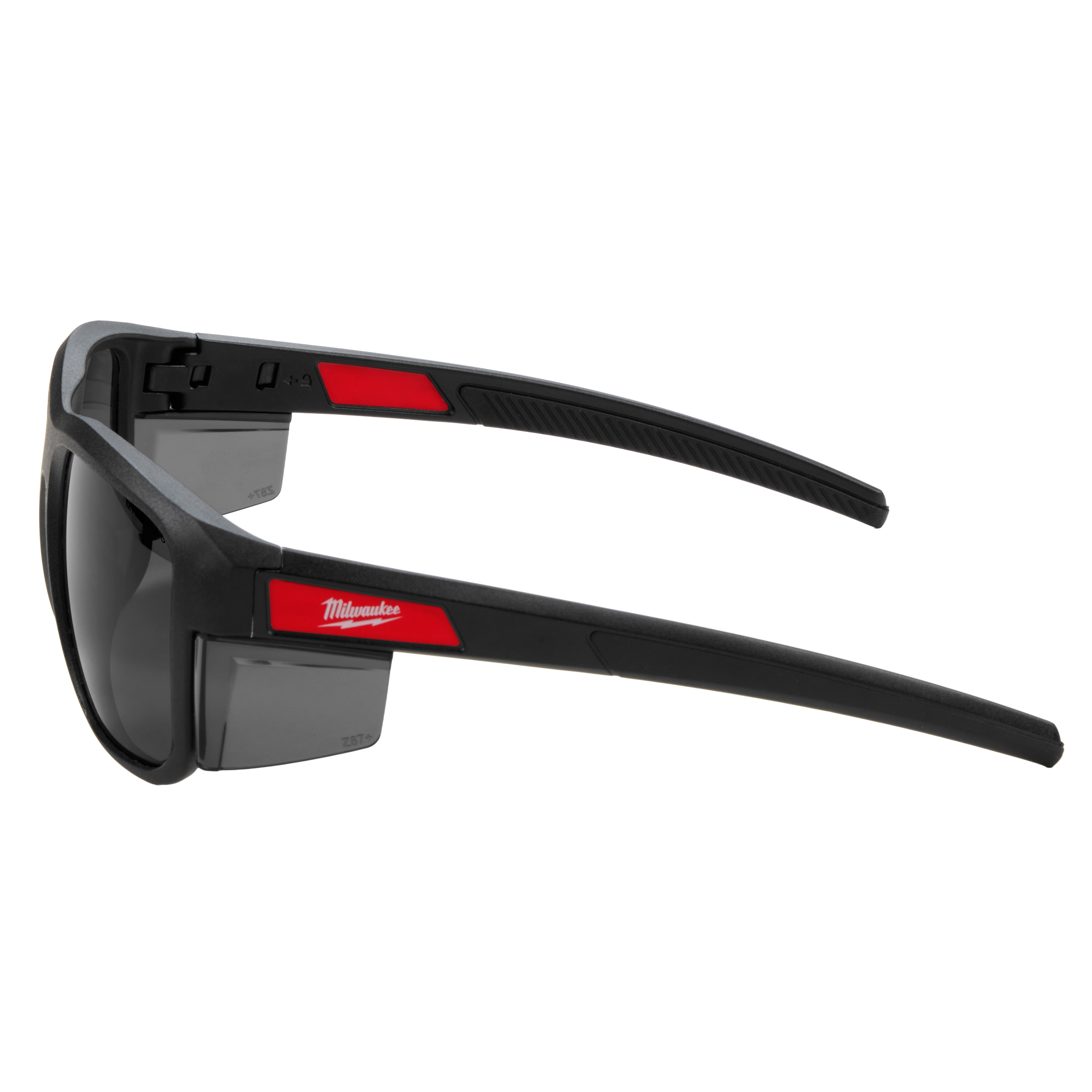 Full Frame Safety Glasses with Removable Side Shields feature tinted anti-scratch lenses. The glasses have a robust black frame with red accents and removable side shields for additional protection. Brand logo is visible on the temples. Designed for high durability and protection in various environments.