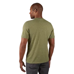 Back view of a person wearing a green FREEFLEX Hybrid Work Tee - Short Sleeve paired with gray pants.