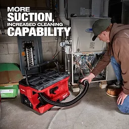 M18 FUEL 4 Gallon Wet/Dry Vacuum w/ PACKOUT Compatibility & VACLINK used to clean a furnace area in a basement.
