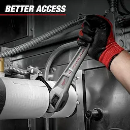 A person wearing red and black gloves uses the Milwaukee 14" Aluminum Pipe Wrench to tighten a pipe in an industrial setting. The text "Better Access" is displayed at the top left of the image.