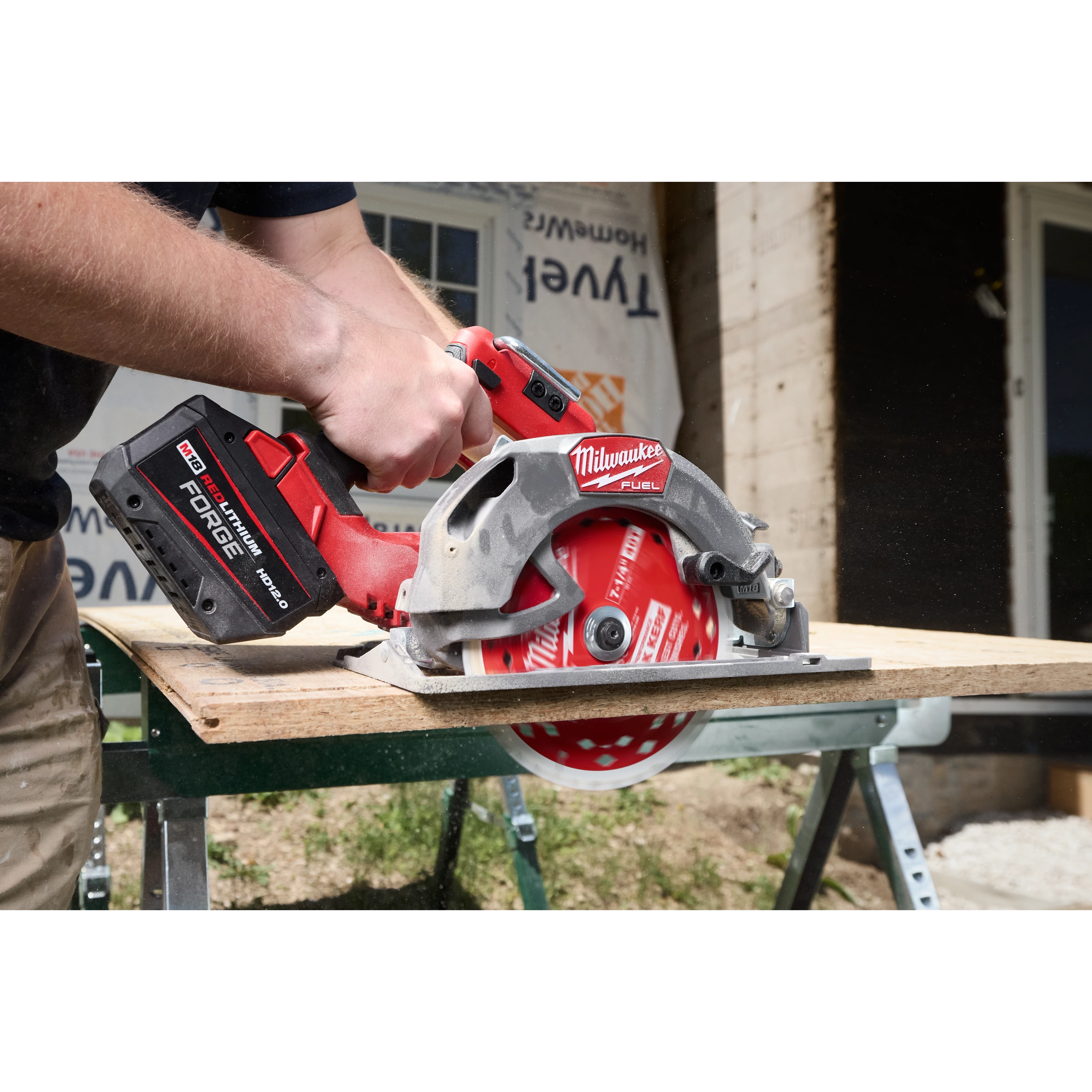 A handheld circular saw cuts a board, featuring a 7-1/4" 40T Thick Kerf Finish Circular Saw Blade.