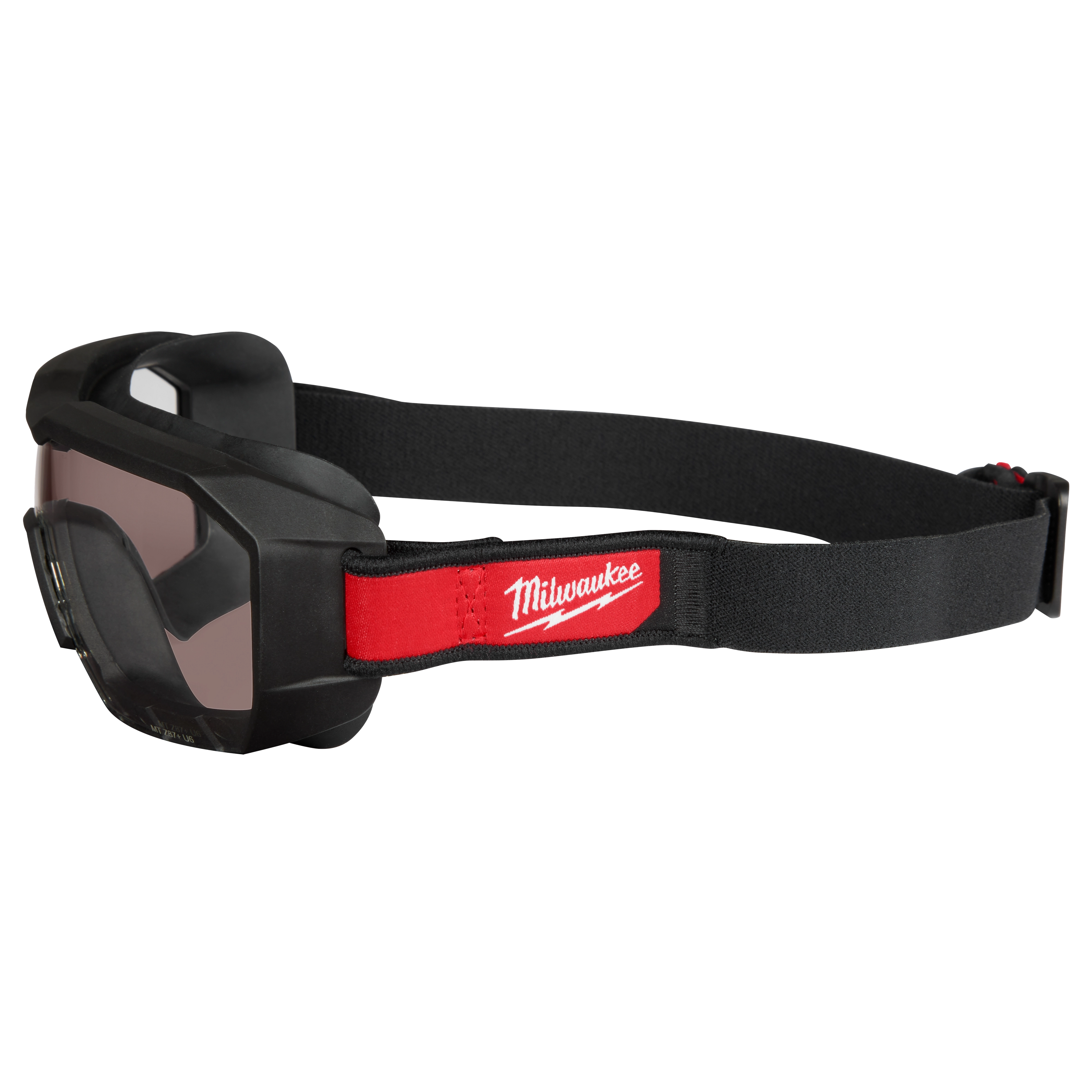 Vented Low-Profile Goggles with Tinted Dual Coat Lens featuring a black frame, adjustable strap, and a red section displaying the Milwaukee logo.