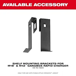 The image features two black shelf mounting brackets designed for the M18™ and M12™ Gangbox Rapid Charger. Text above the brackets reads "AVAILABLE ACCESSORY." At the bottom, there is the product number, 49-16-1804, and a note indicating compatibility with piano-style Crescent® JOBOX®.
