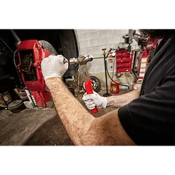 Worker using the 16oz Steel Ball Peen Hammer