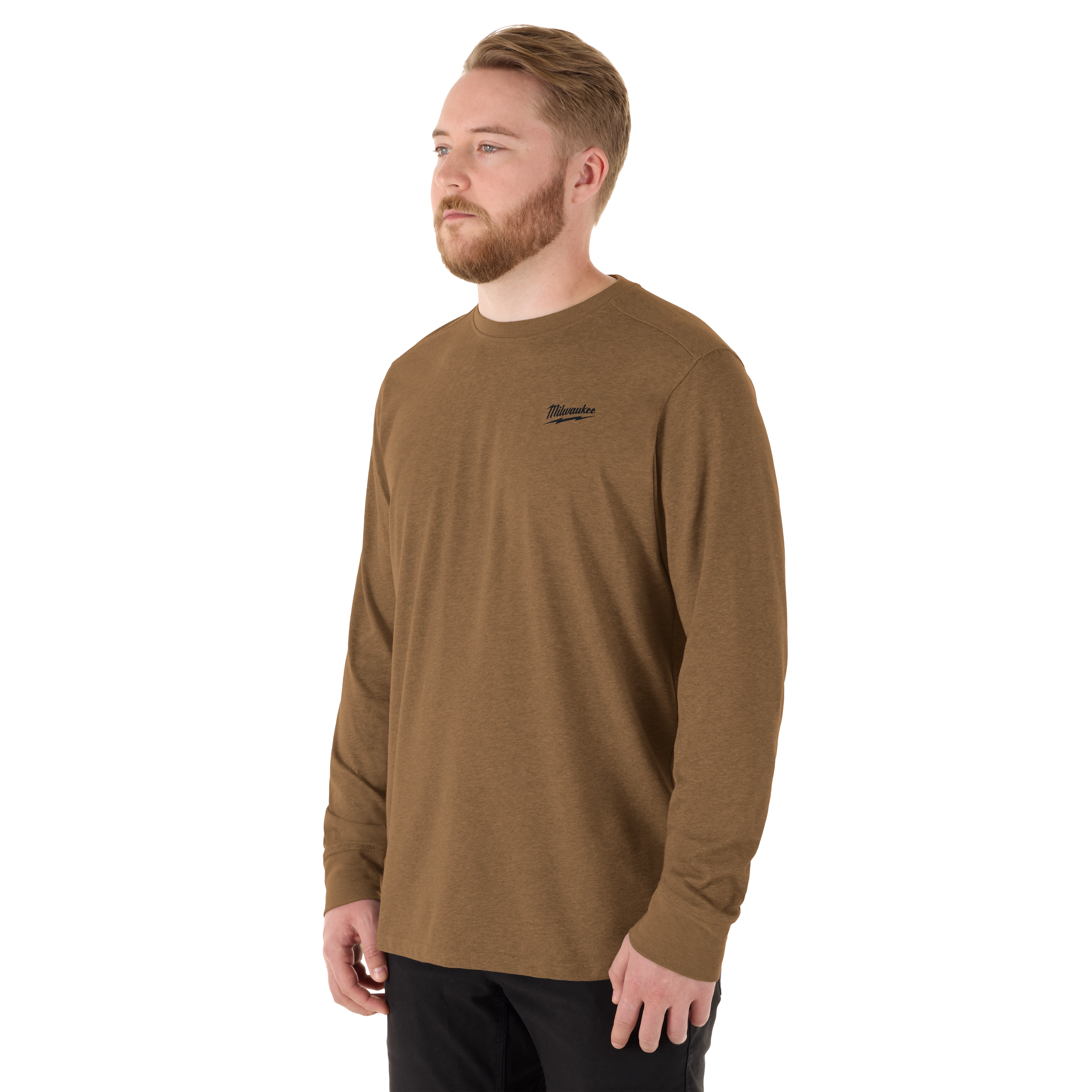A person wearing the FREEFLEX Hybrid Work Tee - Long Sleeve, a brown long-sleeve work shirt.
