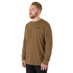 A person wearing the FREEFLEX Hybrid Work Tee - Long Sleeve, a brown long-sleeve work shirt.