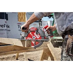 Worker cutting a wooden beam with a circular saw using a 10-1/4" 40T Thick Kerf Finish Circular Saw Blade.