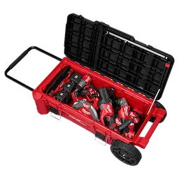 PACKOUT Rolling Tool Chest with Compact Split Lid open, filled with assorted red power tools and batteries.