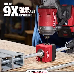 SHOCKWAVE Impact Duty 1/2" Threaded Rod Nut Runner attached to a threaded rod on a workbench.