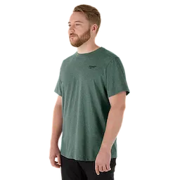 A man wearing a green FREEFLEX Hybrid Work Tee - Short Sleeve shirt. The shirt features a relaxed fit, short sleeves, and a small black logo on the left chest.