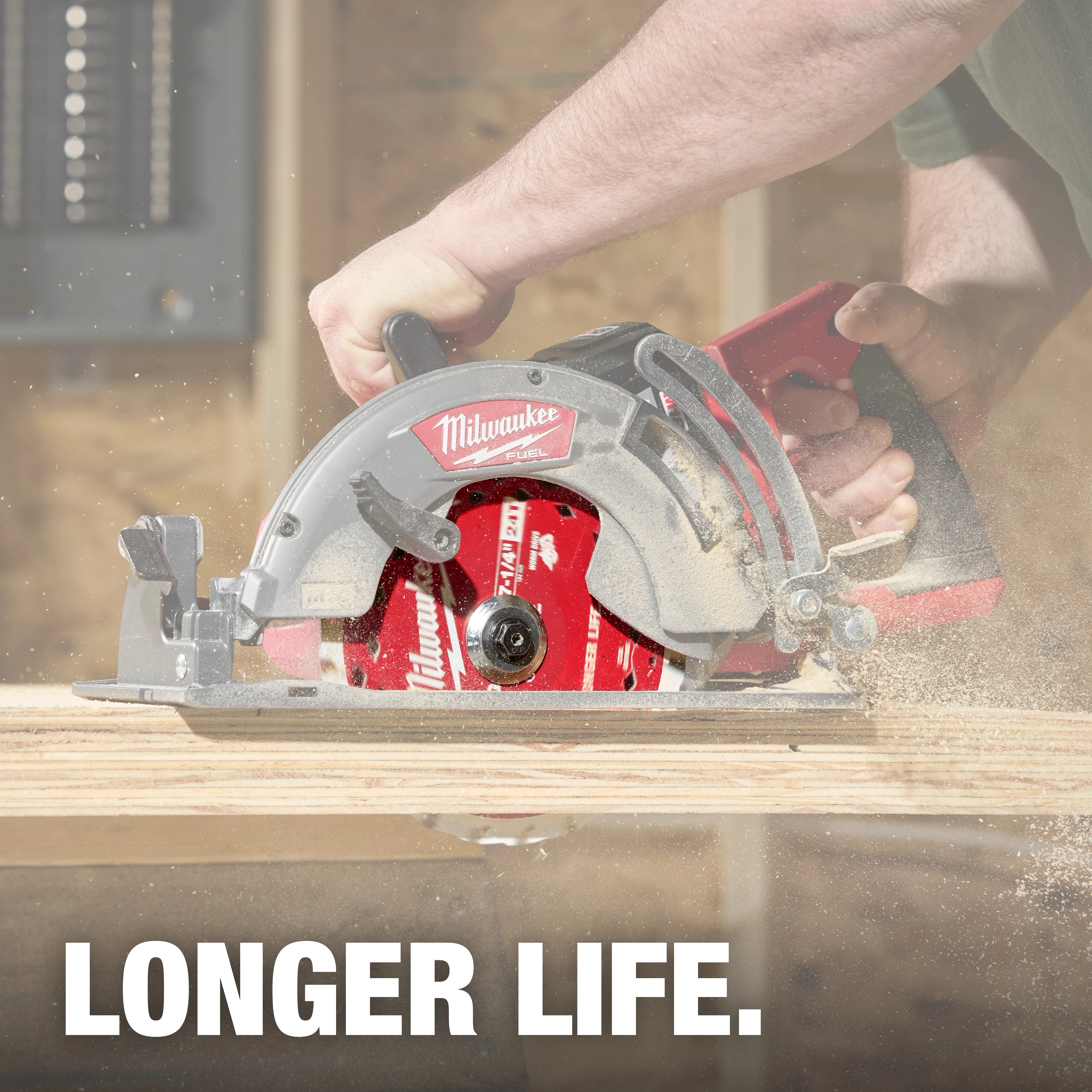 A person uses a circular saw with a red 7-1/4" 24T Framing Circular Saw Blade to cut through wood. The text "LONGER LIFE." appears at the bottom.