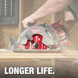 A person uses a circular saw with a red 7-1/4" 24T Framing Circular Saw Blade to cut through wood. The text "LONGER LIFE." appears at the bottom.