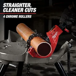 The Milwaukee Pipe Cutter is shown cutting a copper pipe. The tool is red and uses four chrome rollers for straighter, cleaner cuts. A gloved hand is operating the pipe cutter, which is clamped onto a gray workbench.
