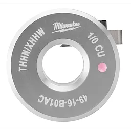 A circular, metallic, 1/0 AWG Cu THHN/XHHW Bushing tool labeled with identification markings, including a small pink dot and the name Milwaukee.