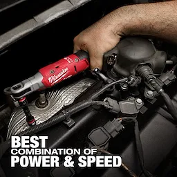 A person uses the M12 FUEL™ 3/8" Ratchet to work on an engine. The red and black tool is shown in close-up, highlighting its ergonomic design and the tagline "Best Combination of Power & Speed" in white text.