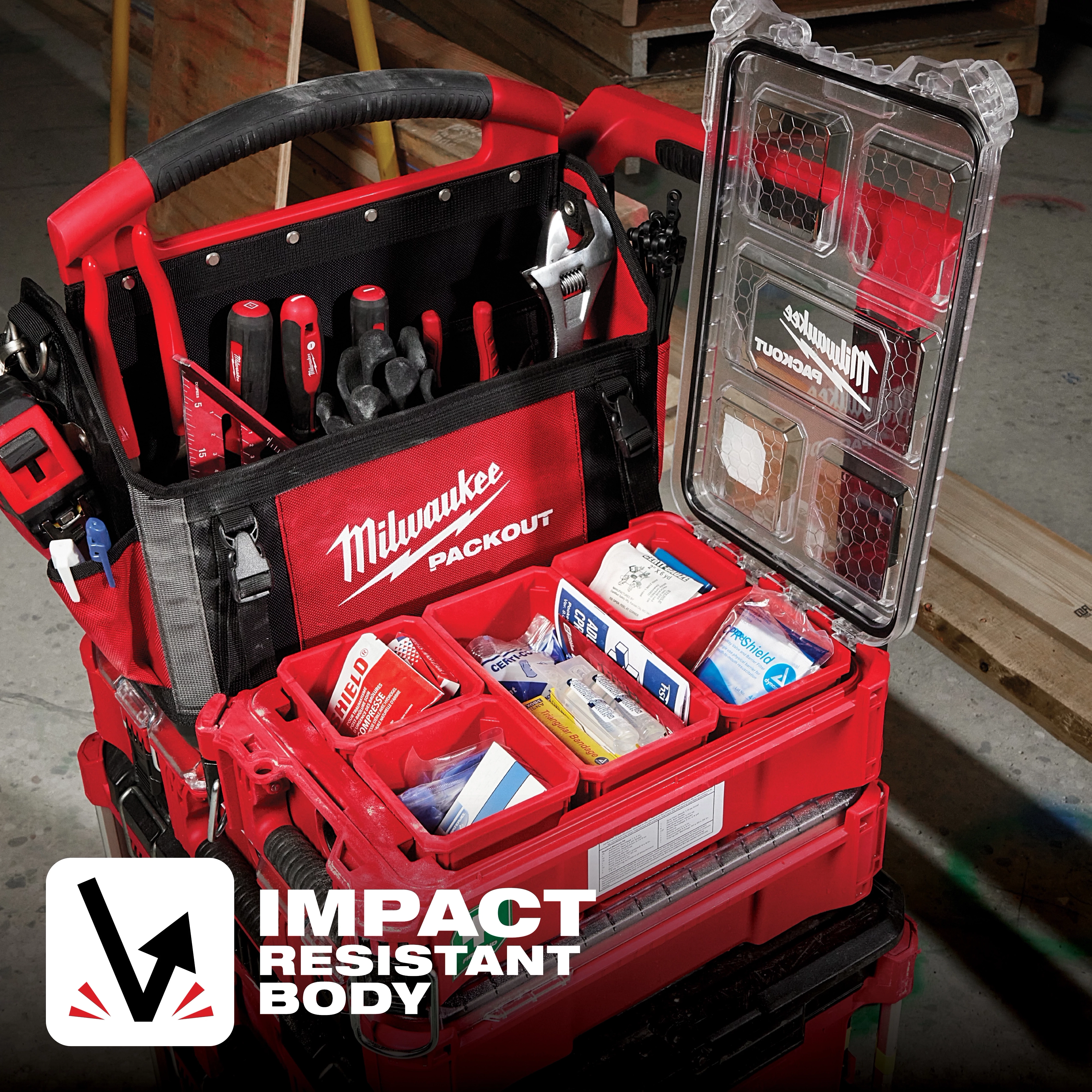 79PC Class A Type III PACKOUT First Aid Kit, shown open, is part of a red tool storage set with multiple compartments and tools.