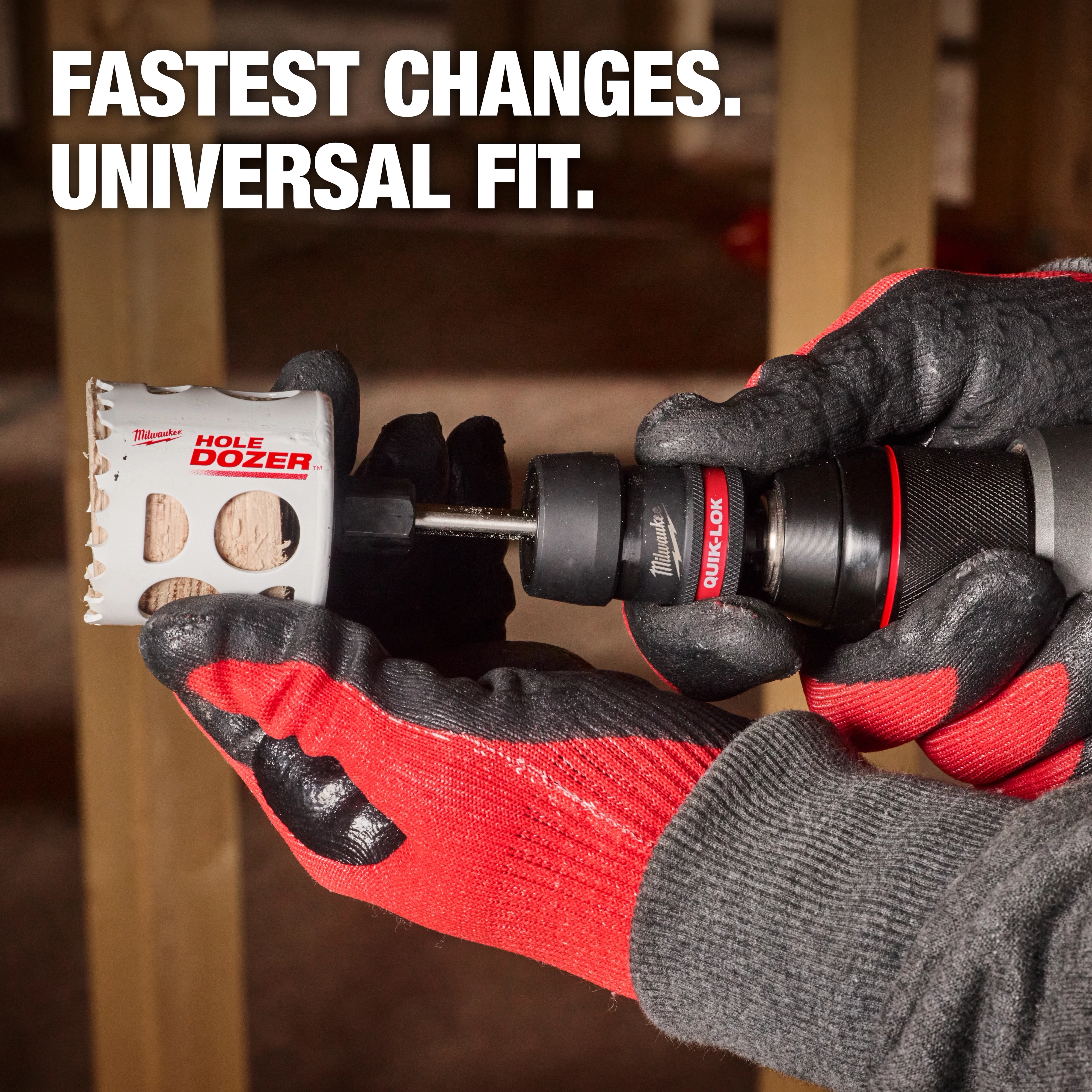 The QUIK-LOK™ Arbor Set is being held in gloved hands, attached to a drill with a Hole Dozer bit. The product is marketed as having "Fastest Changes" and "Universal Fit."