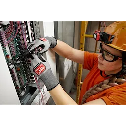 Worker wearing the Cut 3 High-Dexterity Gloves while installing cables