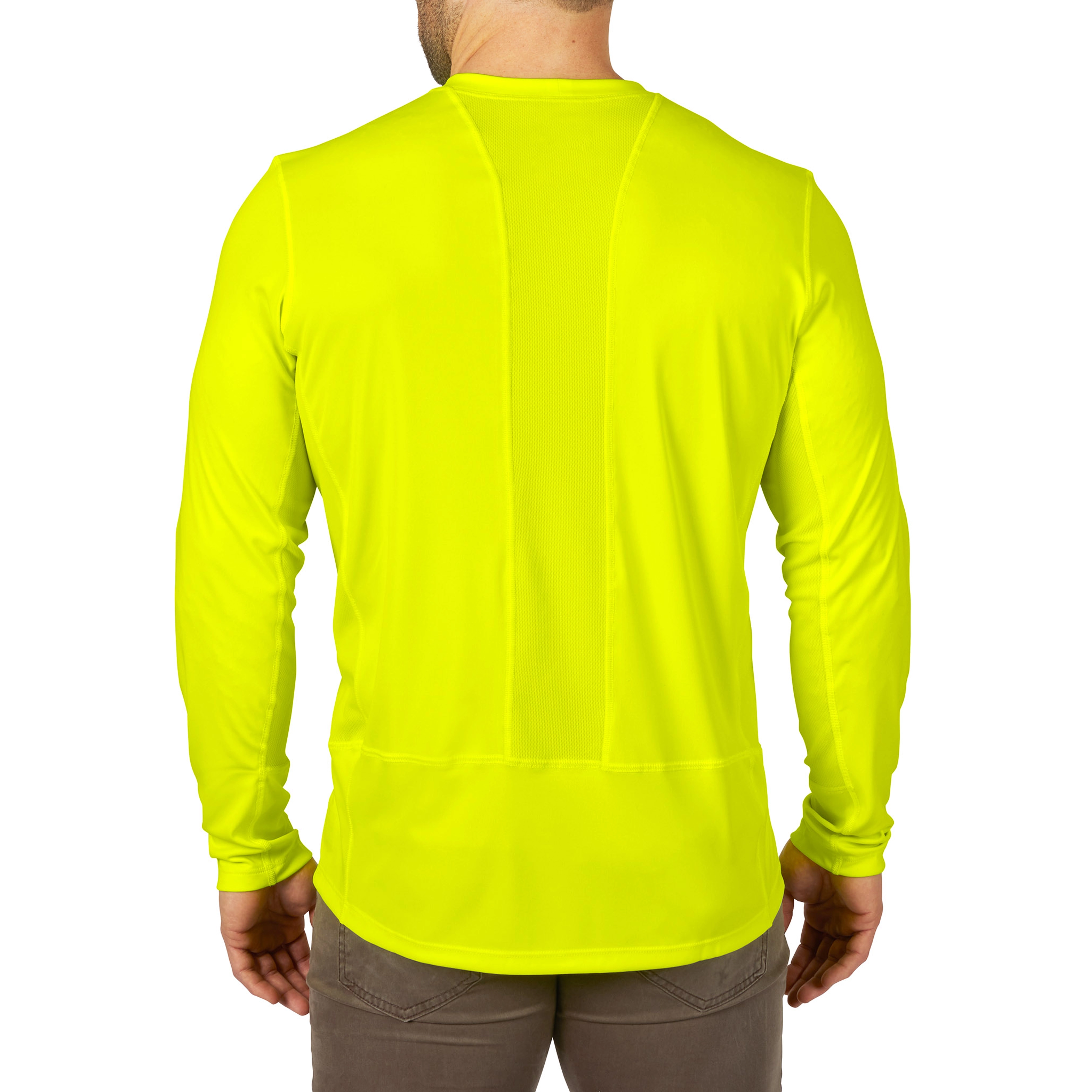 Back view of a man wearing a bright yellow WORKSKIN Lightweight Performance Shirt with long sleeves and beige pants.