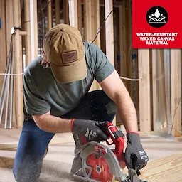 Person in a green shirt wearing a Waxed Canvas Adjustable Hat operates a circular saw. Text reads "Water-Resistant Waxed Canvas Material."