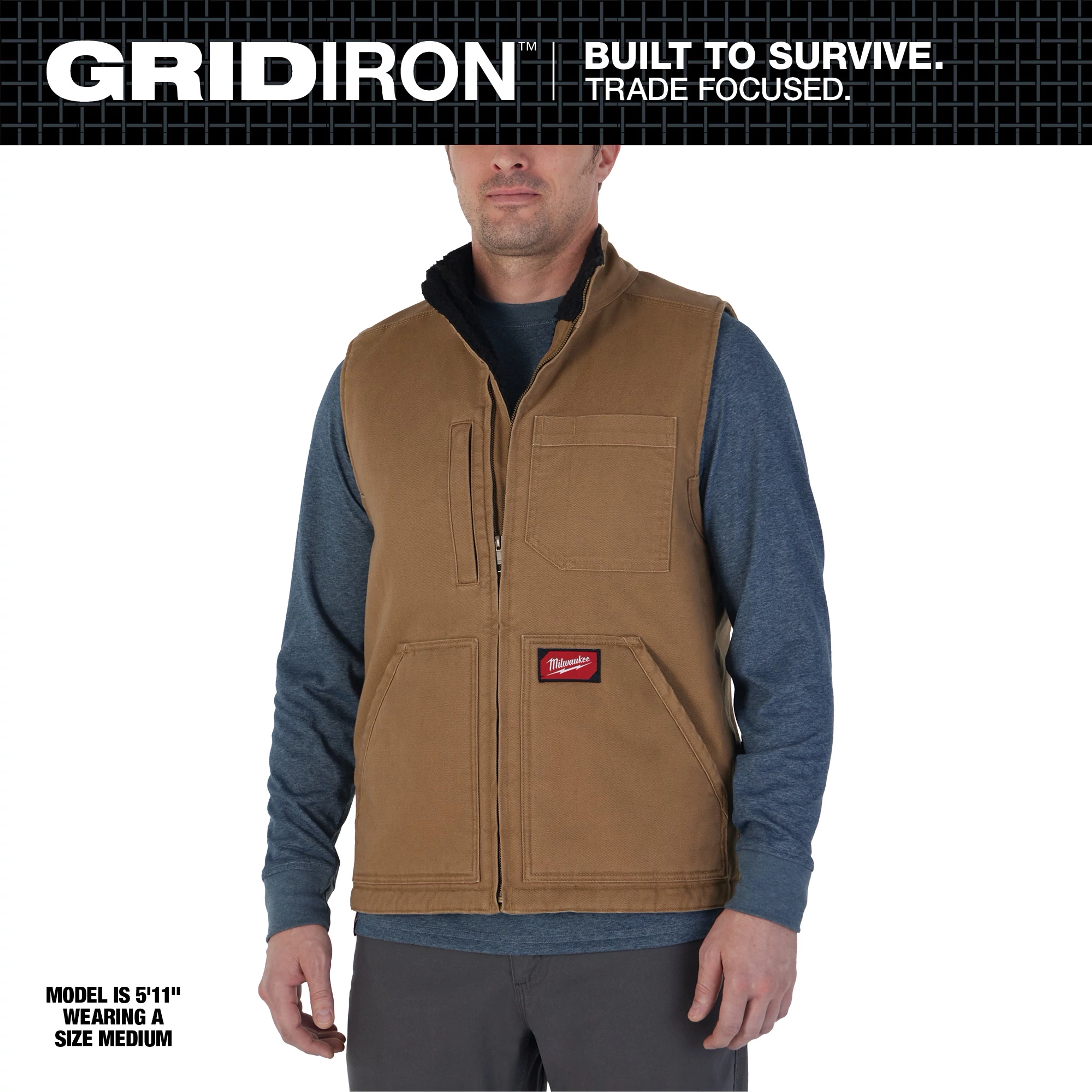 Heavy Duty Sherpa-Lined Vest in Brown, worn by a model with a blue long-sleeve shirt. Model is 5'11" and wears size medium.