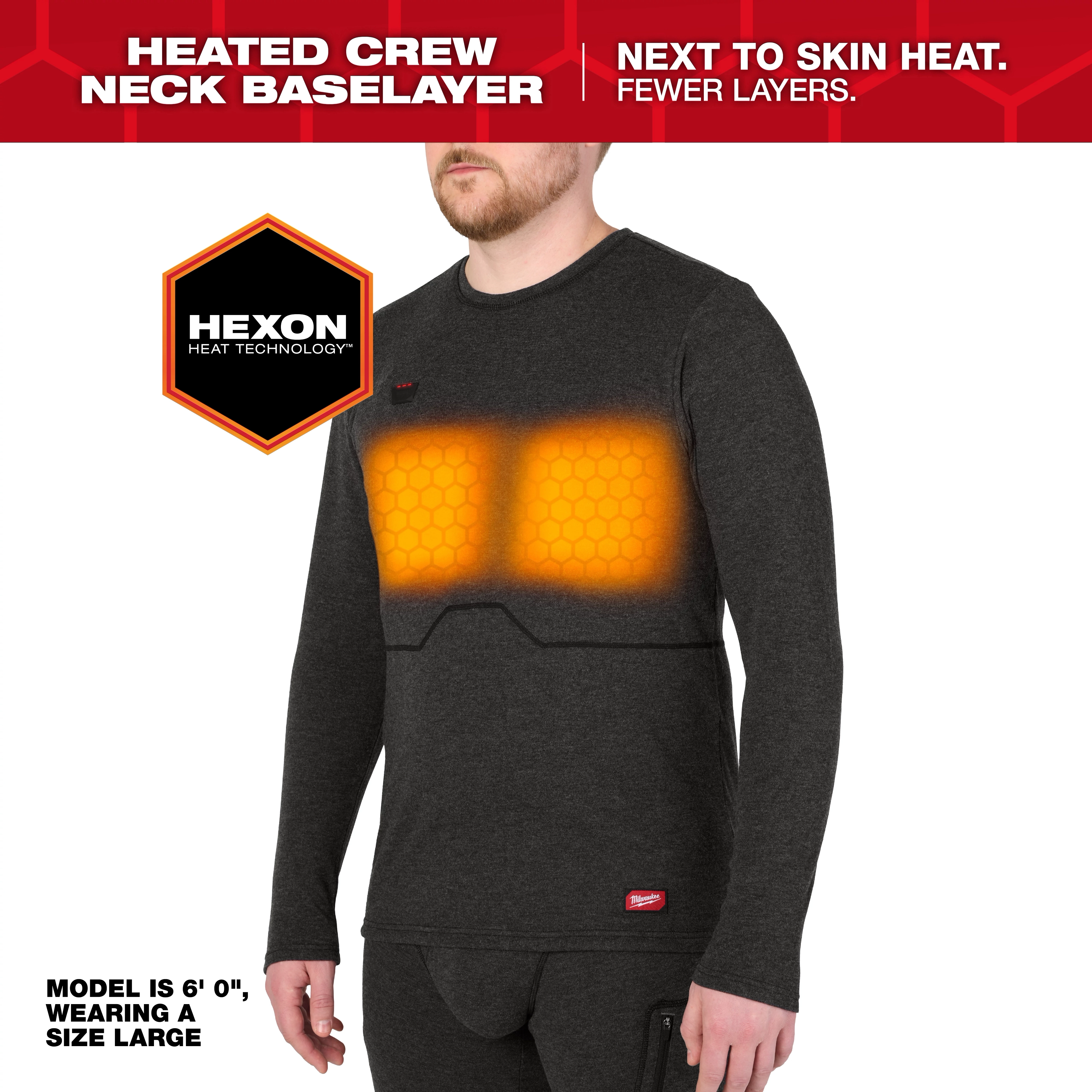 Person wearing a dark Milwaukee Heated Merino Wool Crew Neck Baselayer with glowing heated chest panels.
