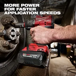 M18 REDLITHIUM HIGH OUTPUT XC5 Resistant Battery Pack attached to a power tool tightening lug nuts on a vehicle wheel.