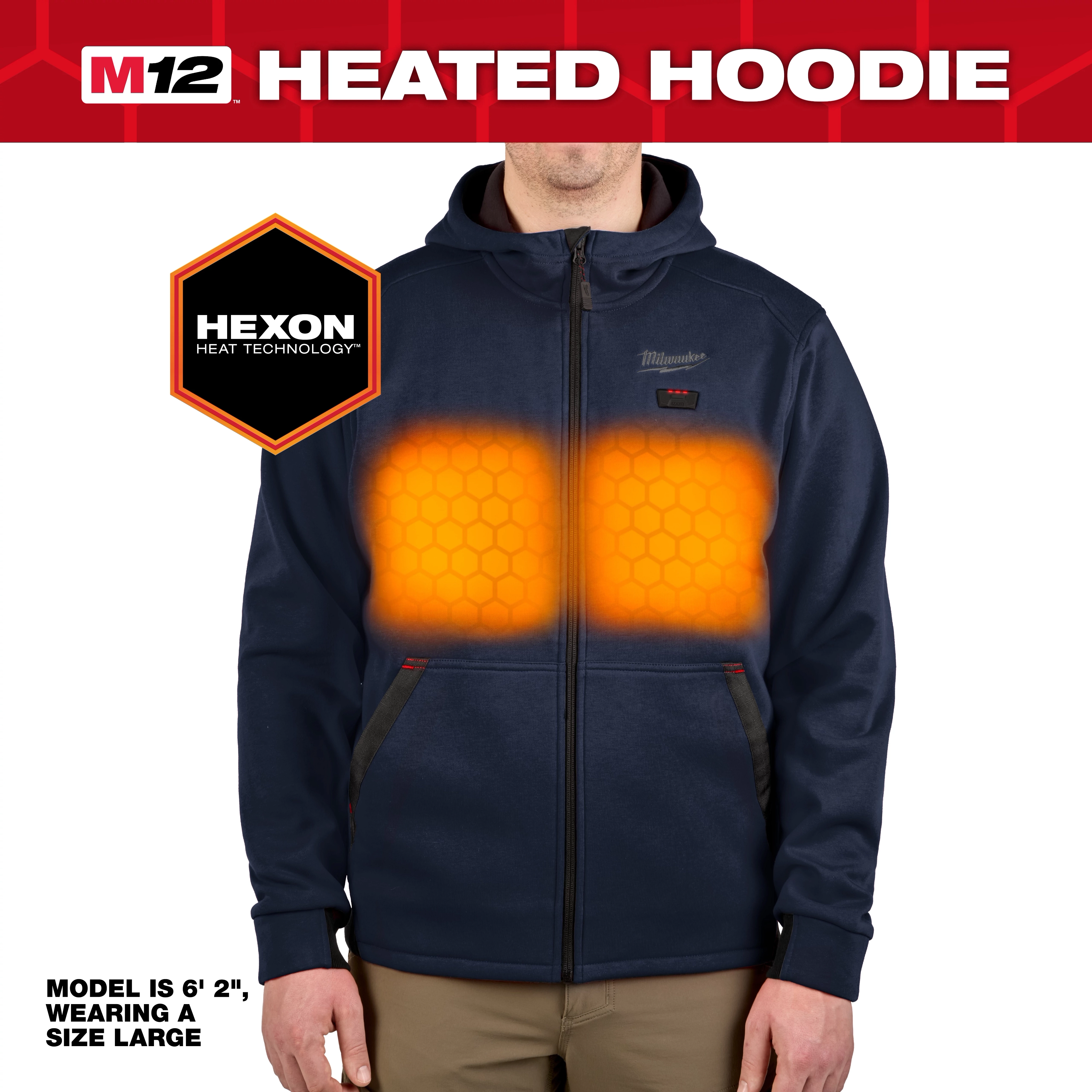 The M12™ Heated Hoodie features Hexon Heat Technology, displayed in a glowing orange pattern across the chest area. The hoodie is navy blue, with a black zipper, and the model wearing it is 6' 2" in height and is wearing a size large.