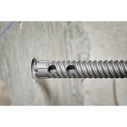 Drill into concrete with a concrete drill bit until rebar is encountered